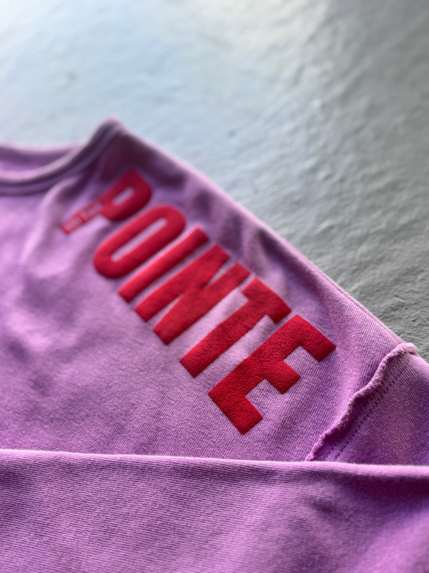 The 'Cold Shoulder' Logo Crop